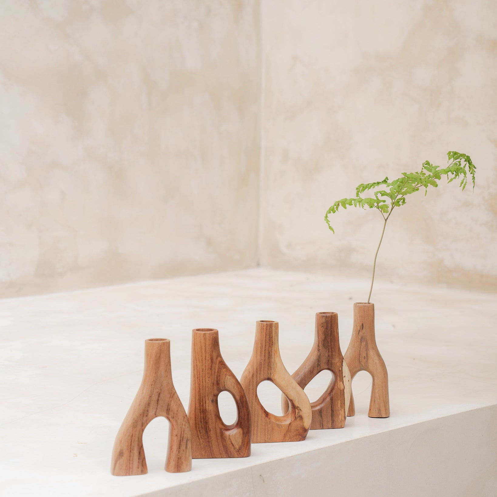 Explore our recycled teak wood vases, perfect for any home. Ethically made, these vases support sustainability and add a touch of mindfulness to your decor. Ideal for both dry and fresh flowers, they embody simple, elegant design.