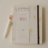 A5 handmade Chrysanthe journal with real pressed chrysanthemum flowers on recycled cover, eco-friendly plain pages, dust bag included – perfect for scrapbooking or journaling