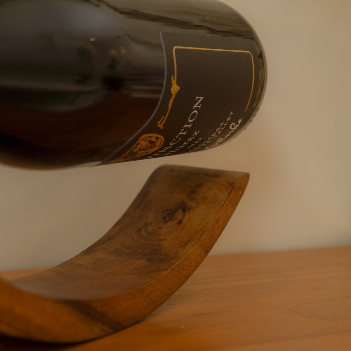 Elegant minimalist modern wooden wine holder stand, 11.4 inches high, perfect for home decor and housewarming gifts.
