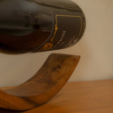 Elegant minimalist modern wooden wine holder stand, 11.4 inches high, perfect for home decor and housewarming gifts.