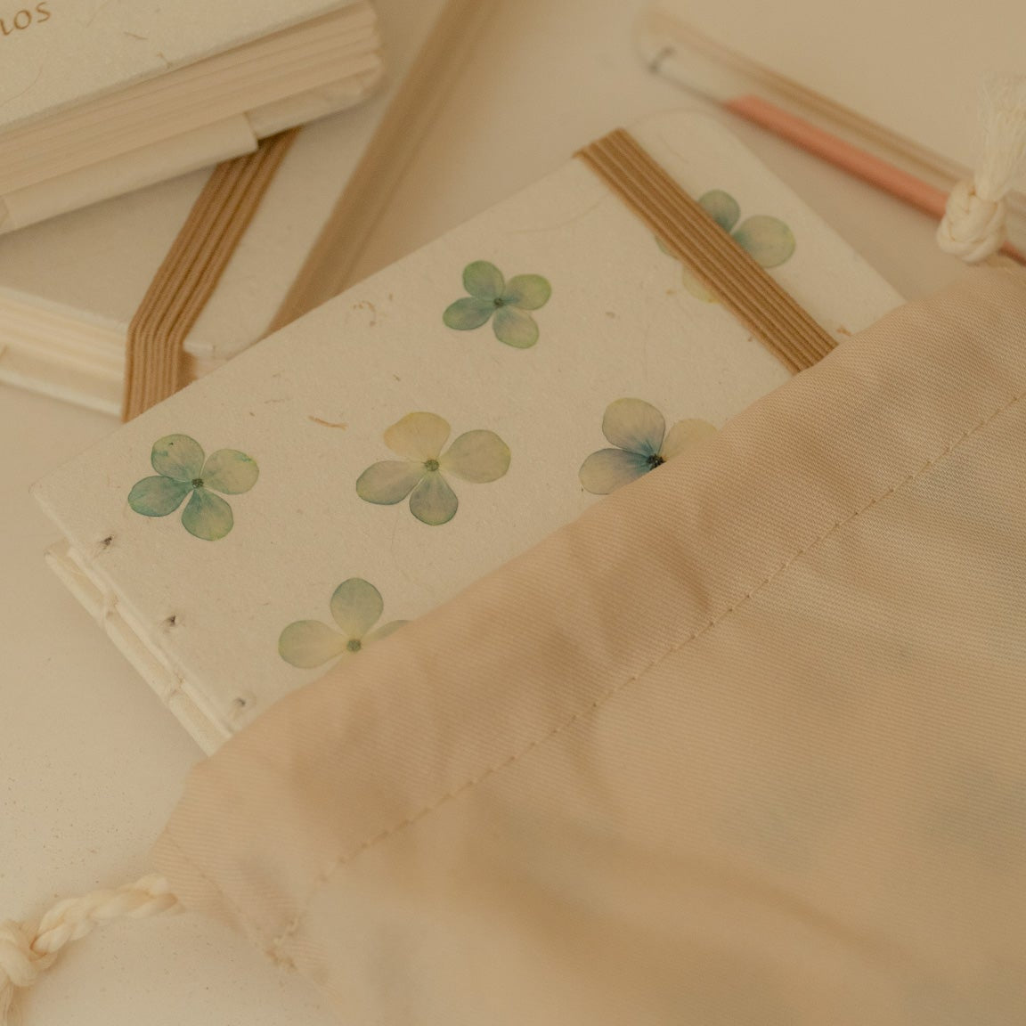 A6 recycled journal with real hydrangea flower cover, flower pen, and dust bag