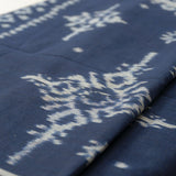 Indigo Eclipse Handloom Blanket, handwoven from 100% natural cotton with intricate patterns in deep indigo hues, crafted using traditional techniques.