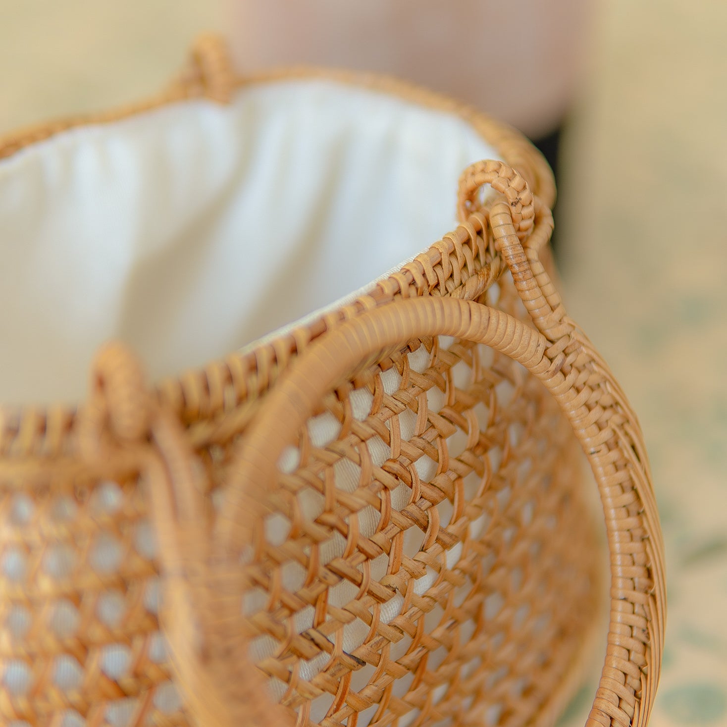 Close-up of a woven basket with a blurred background