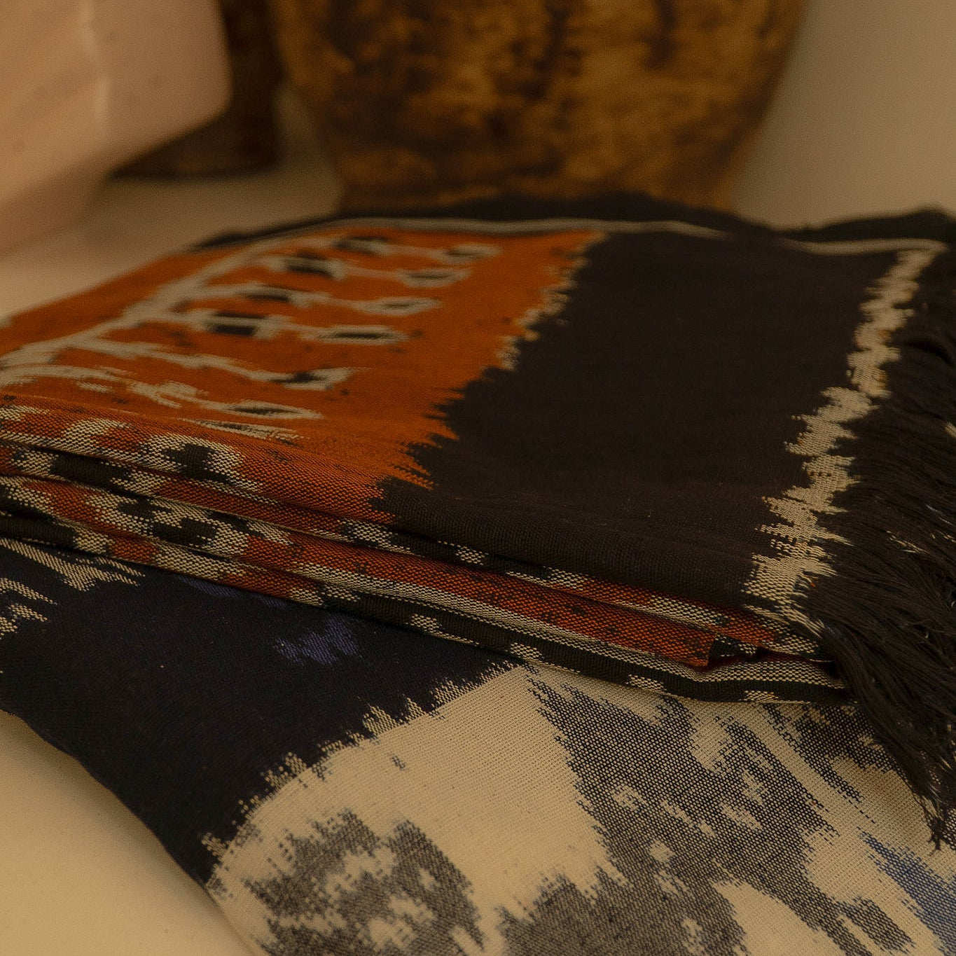 A collection of different patterns of handloom blanket in natural cotton