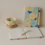 Hanami Morning Set – handmade journaling gift set with indigo blue floral journal, flower mug, natural wooden coaster, and pen for self-care and mindfulness