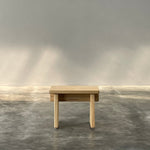 Brass towel bar on a marble wall