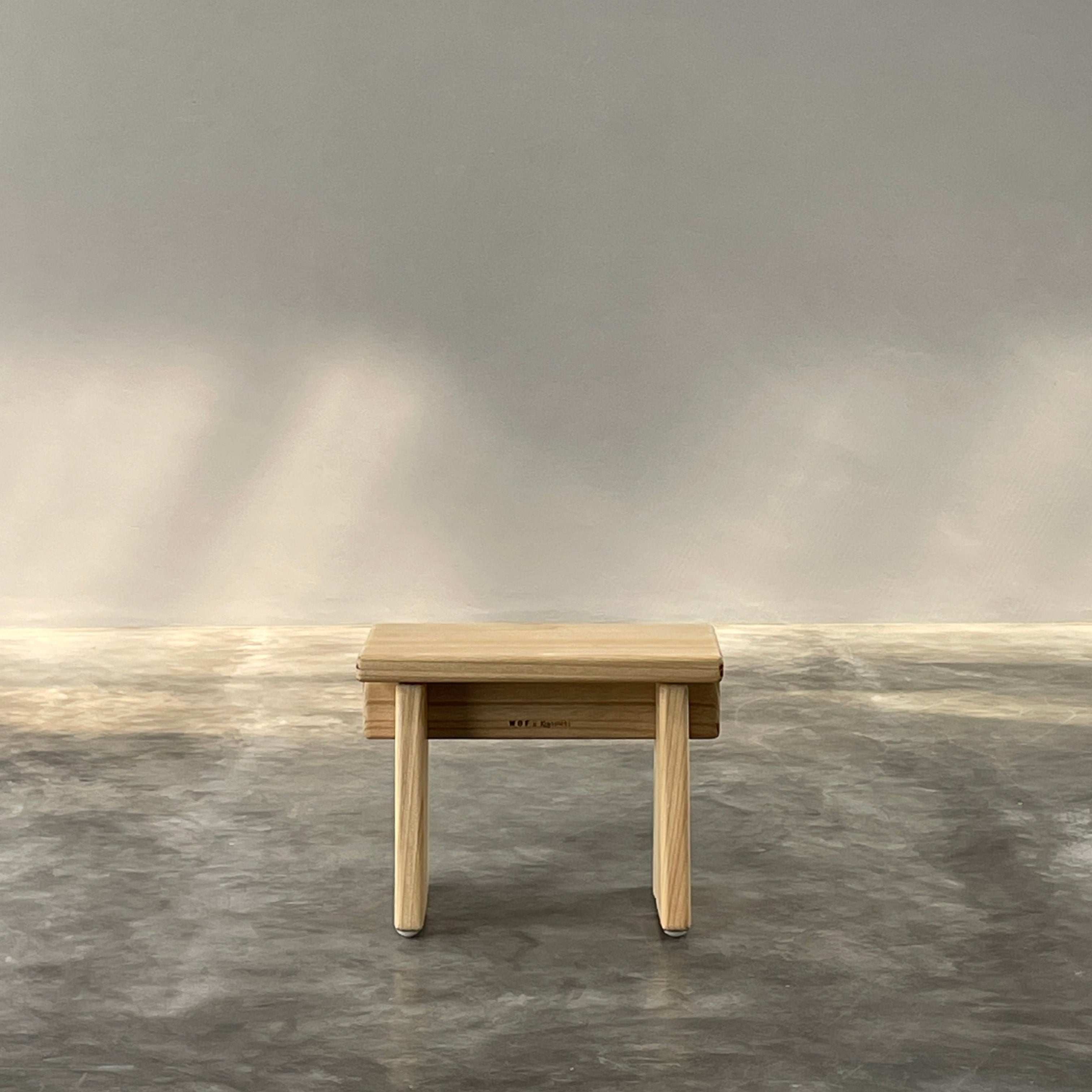 Brass towel bar on a marble wall