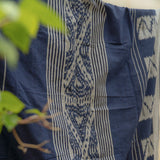 Indigo Horizon Handloom Blanket – A fully handwoven cotton throw with intricate patterns, crafted using traditional handloom techniques.