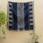 Indigo Horizon Handloom Blanket – A fully handwoven cotton throw with intricate patterns, crafted using traditional handloom techniques.