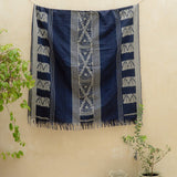 Indigo Horizon Handloom Blanket – A fully handwoven cotton throw with intricate patterns, crafted using traditional handloom techniques.