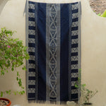Indigo Horizon Handloom Blanket – A fully handwoven cotton throw with intricate patterns, crafted using traditional handloom techniques.