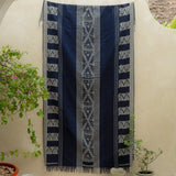 Indigo Horizon Handloom Blanket – A fully handwoven cotton throw with intricate patterns, crafted using traditional handloom techniques.