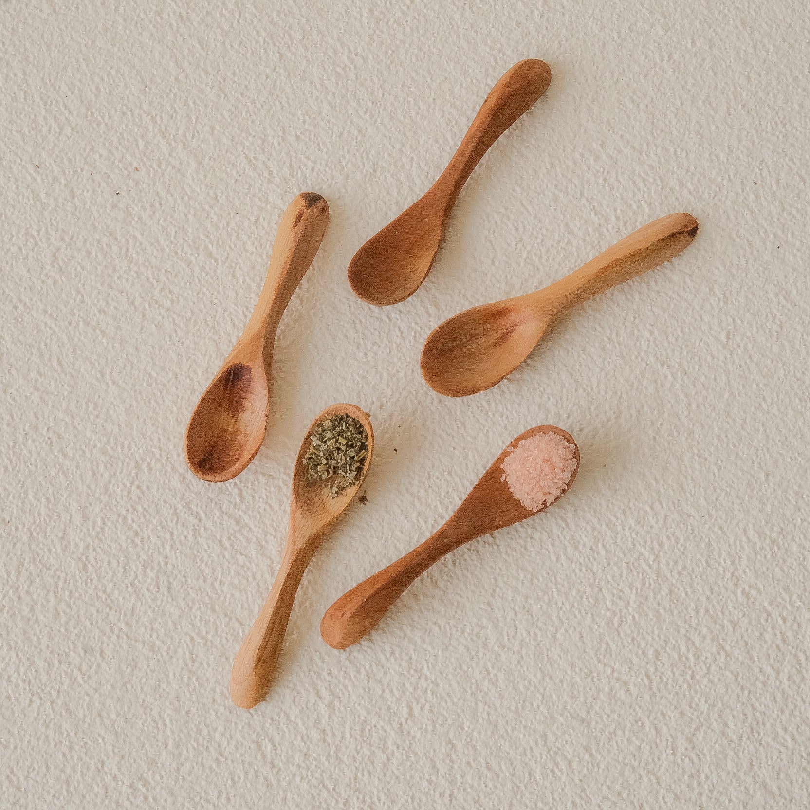 Set of 5 Lara Mini Curved Wooden Spoons handcrafted from reclaimed teak – designed for salt, spices, and herbs, fits perfectly into small kitchen jars
