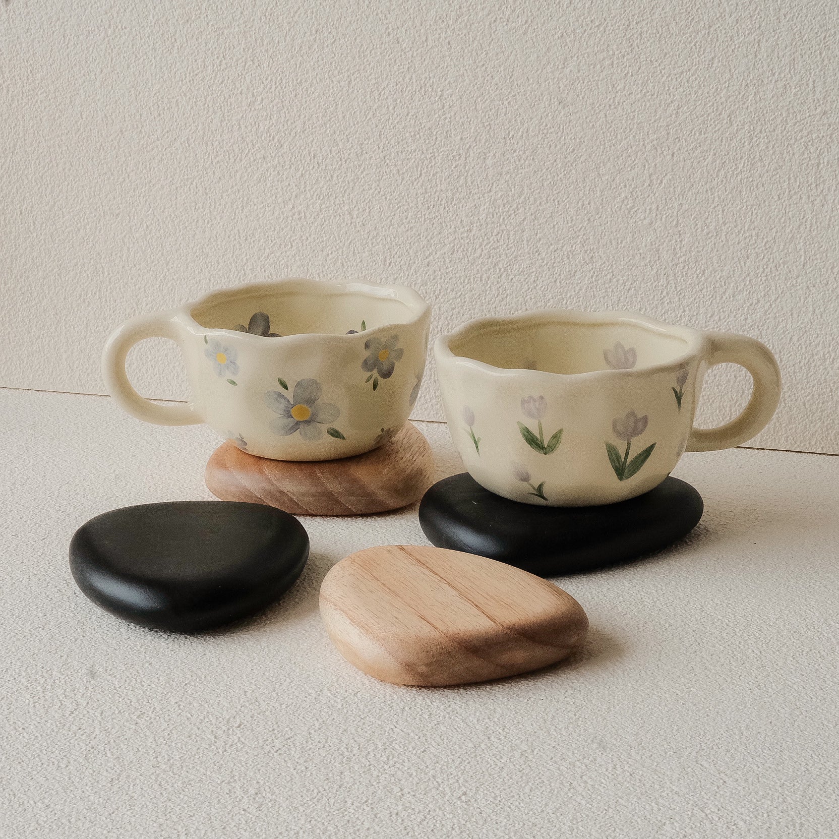 Set of 4 handcrafted Nami Wooden Pebble Coasters – available in Natural and Black Noir finish, wide smooth curved surface, eco-conscious Japandi style