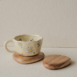Set of 4 handcrafted Nami Wooden Pebble Coasters – available in Natural and Black Noir finish, wide smooth curved surface, eco-conscious Japandi style