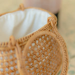 Close-up of a woven basket with a blurred background