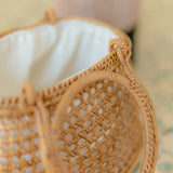 Close-up of a woven basket with a blurred background
