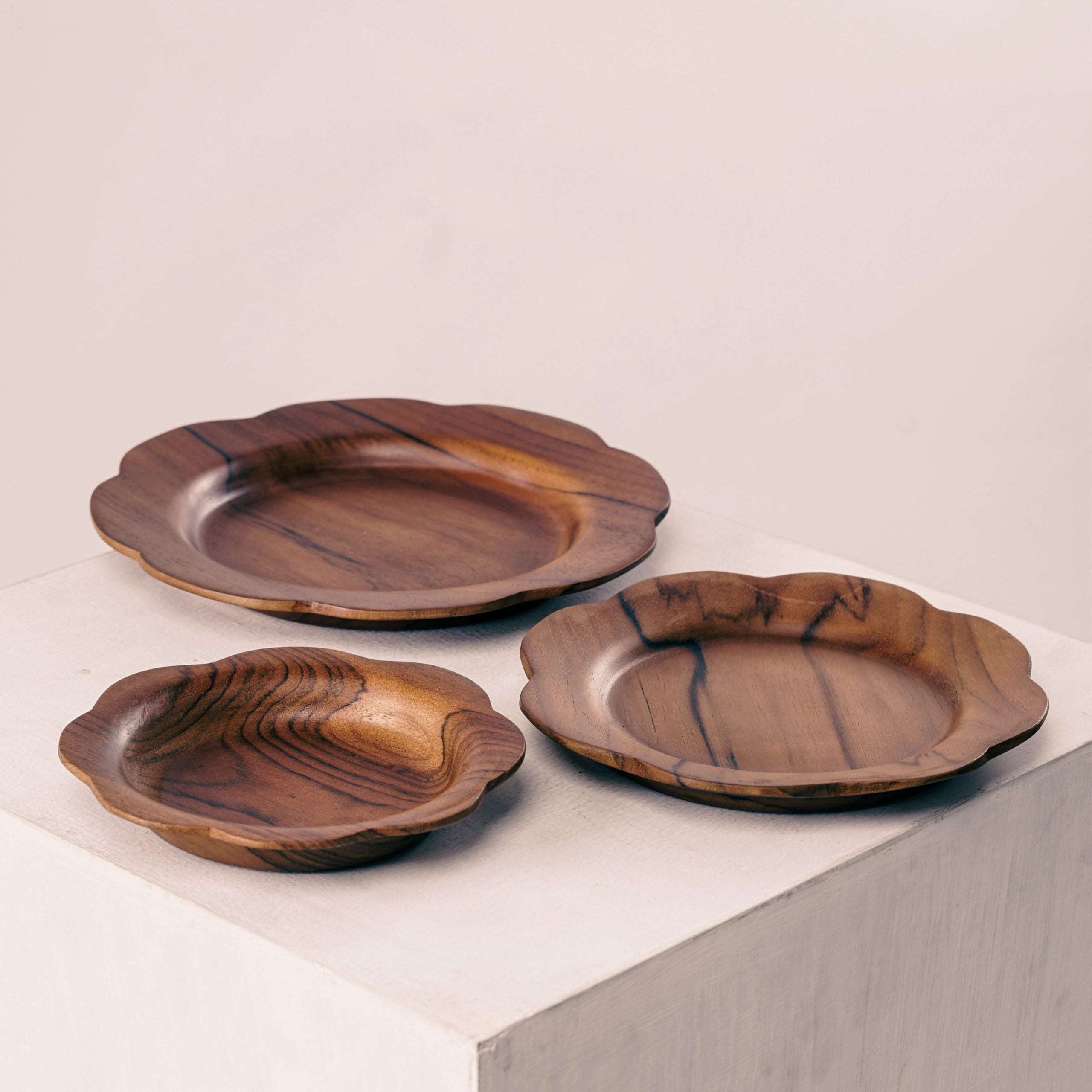 Wooden scalloped plates handmade from teak wood, available in small, medium & large sizes. Food-safe, dishwasher-safe with free oil on 2+ orders.